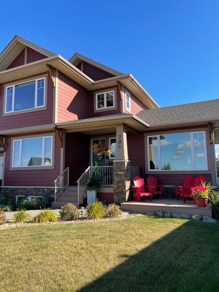 A two storey house in Red Deer, Alberta with clean windows professionally cleaned by New Clear Window