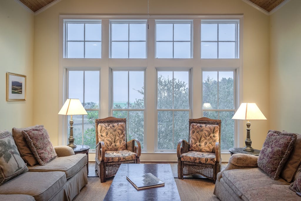 Tall windows in house that were professionally cleaned and provide a clear view outside